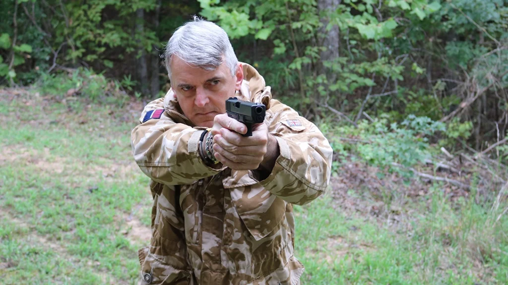 The author shooting his Glock 20 rescue.