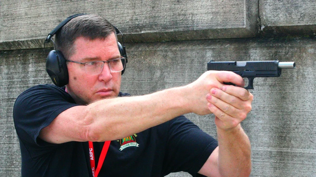 The author shooting the Glock G20 Gen 5.