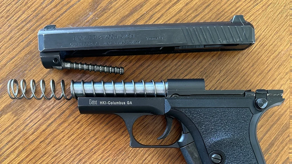 The H&K P7 PSP has a gas port leading into a tube under the barrel, which houses a piston attached to the slide assembly.