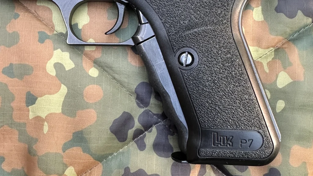 Sitting prominently on the front strap, and pivoting at the butt of the grip, the squeeze-cocker means that the gun can be carried in any condition safely.