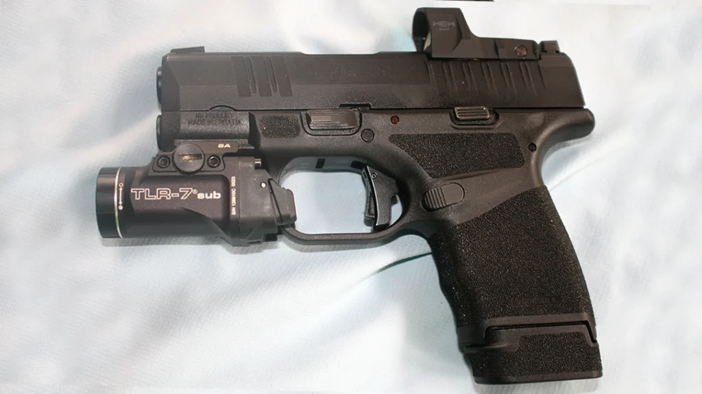 A weapon-mounted light that sticks out past the muzzle of your pistol prevents the slide being forced out of battery.