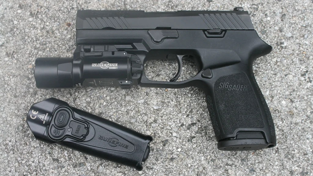 A pistol with a weapon-mounted light is not a substitute for a stand-alone light, but it serves a necessary purpose.