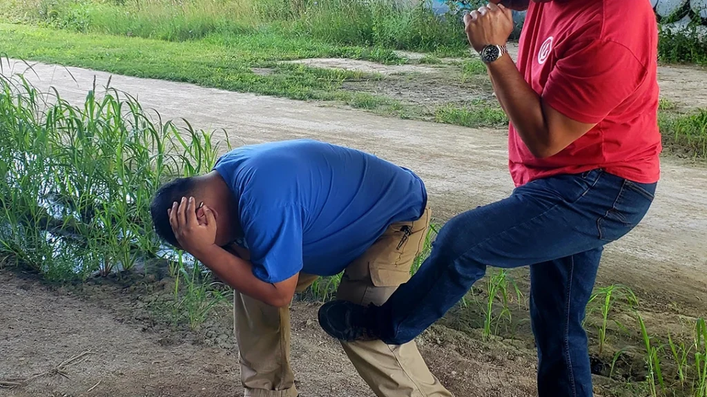 Sam kicks the knee to create distance.