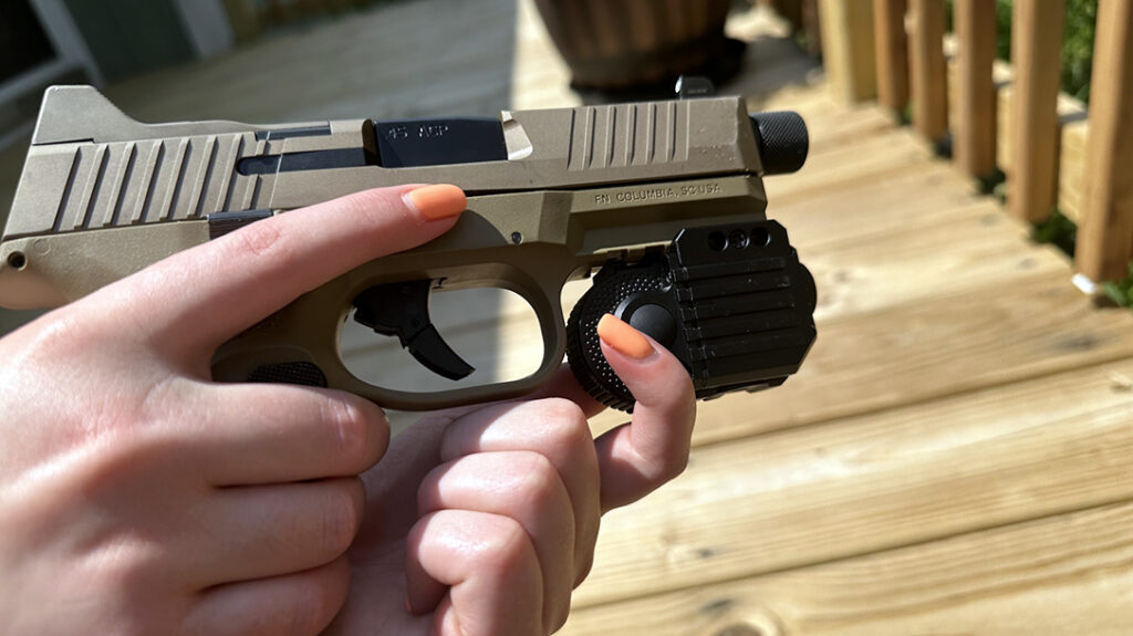 The GunTag slips on the universal rail of most pistols.