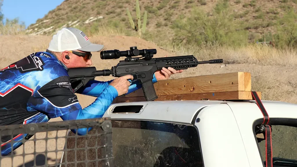 Shooting long-range with an AK rifle. 