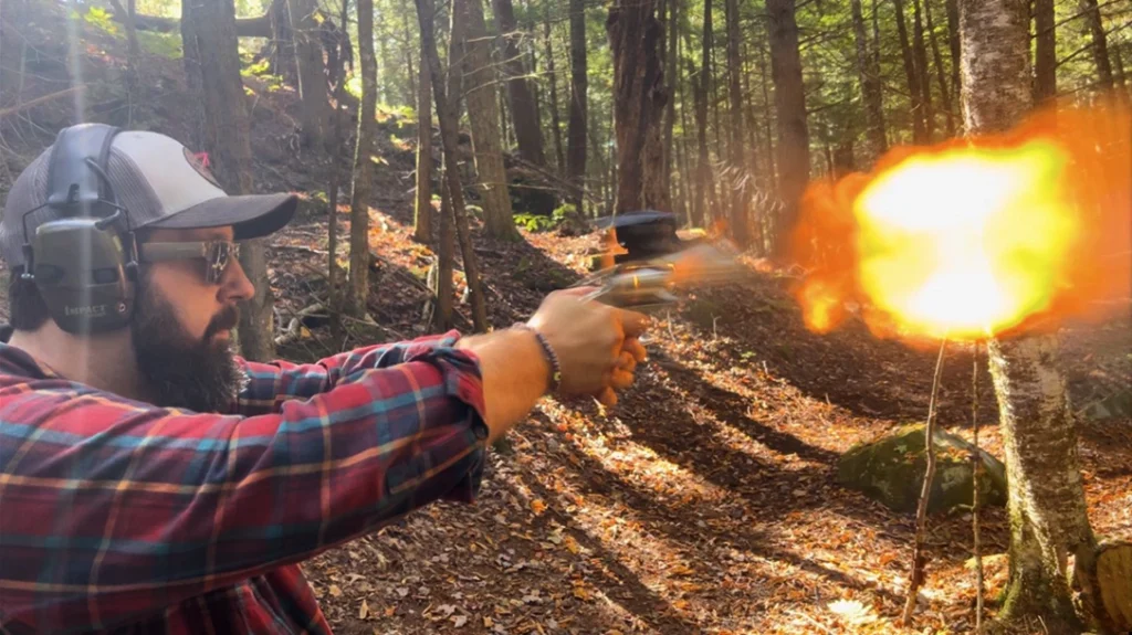 The author shooting the Colt Kodiak.