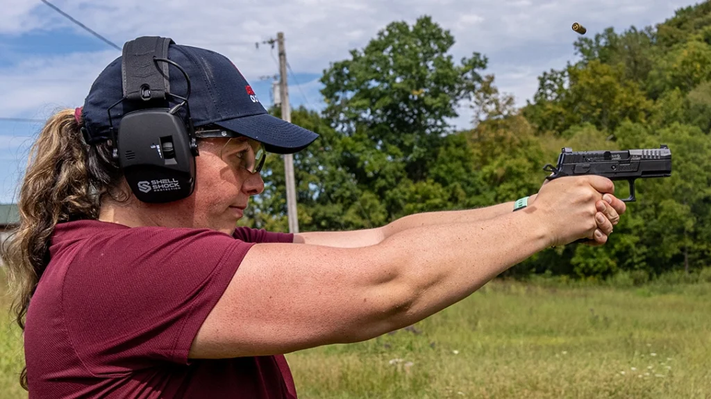 The author shooting the CZ P-09 C Nocturne.