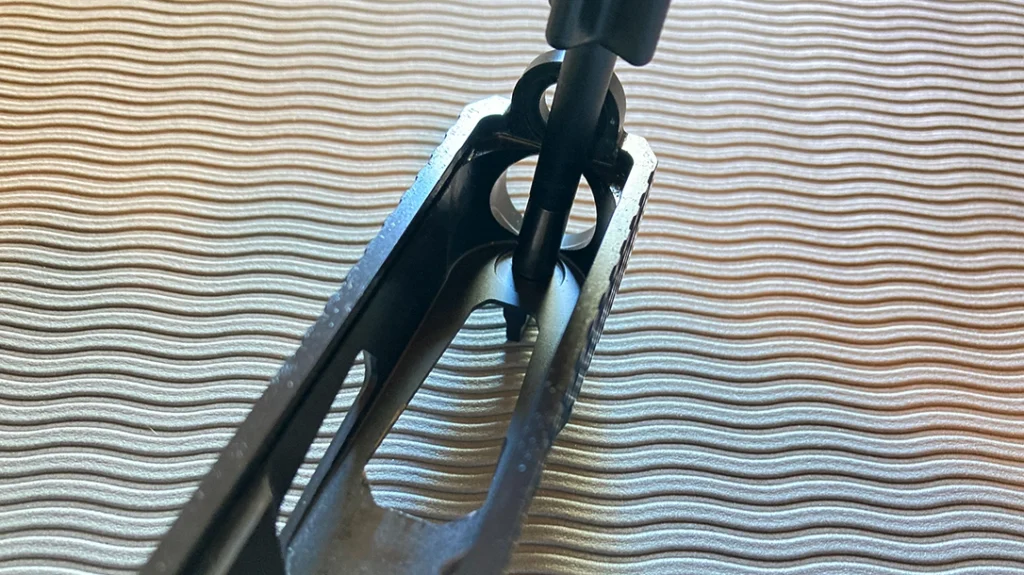 The author makes sure that the last crank on that screw is done with the sight just off of center.