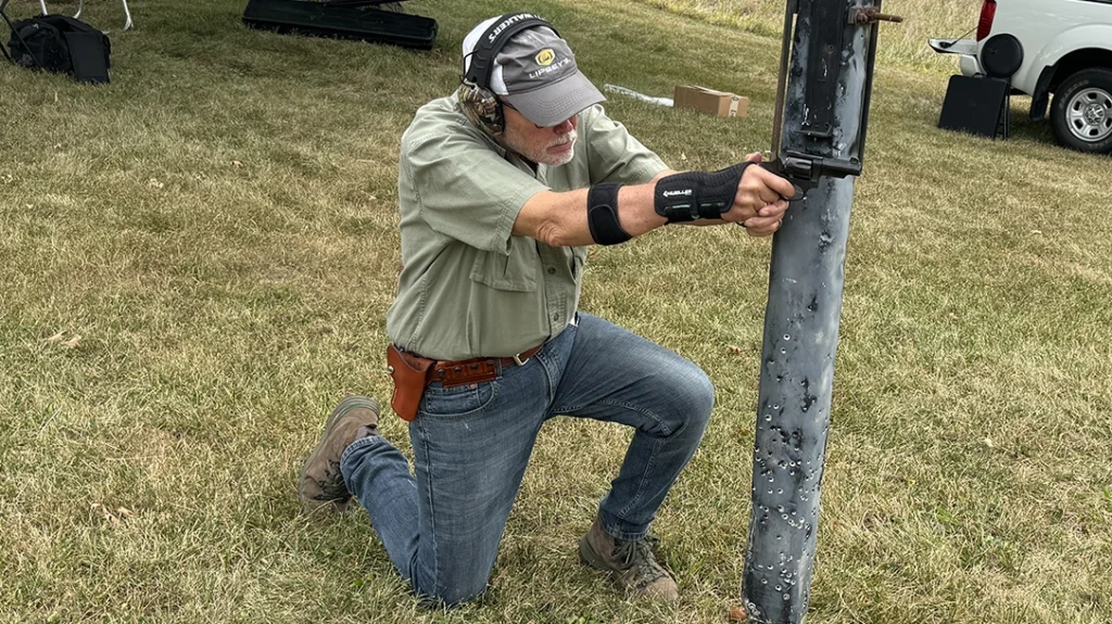 Here, the author is shooting at the 15-yard barricade position; the course was shot twice, once with .32 H&R Magnum ammo, then with .327 Magnum ammo.