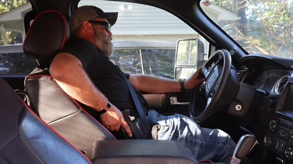 Vehicle Pistol Combat: Drawing from strong-side carry.