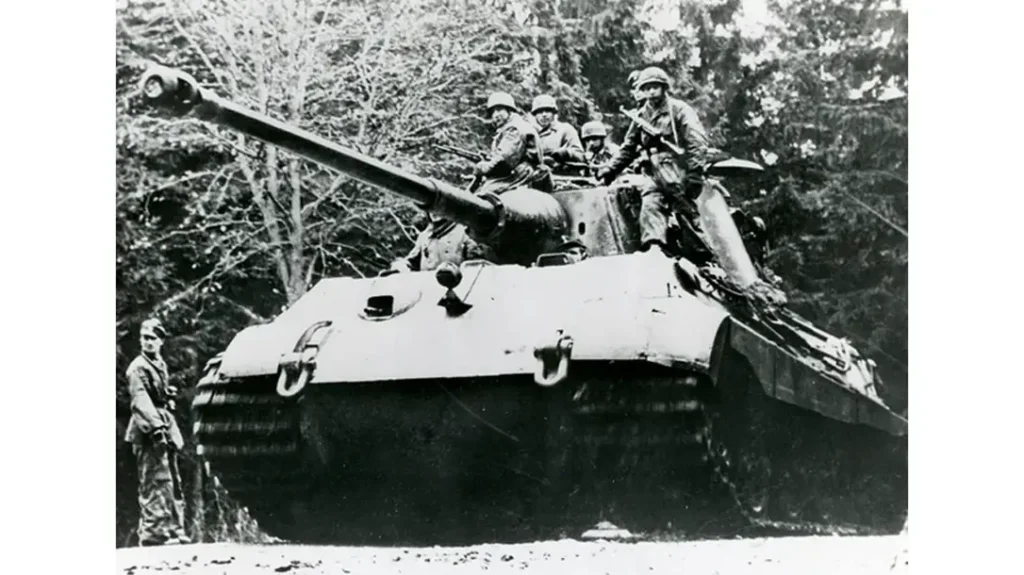 U.S. soldiers on a tank.