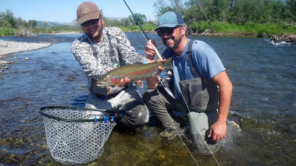 Andy Hill and guide Dave Stelling with Andy’s first sockeye salmon.