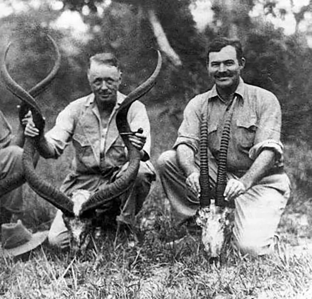 Guide Philip Percival and Ernest Hemingway with trophies shot on Hemingway’s first African safari.