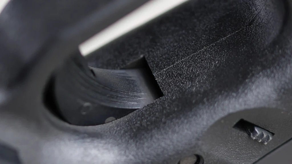 Glock 19 Torture Test: Look up the trigger shoe here, and you can see where the filth from inside the frame is making its way out. The trigger is the only part of this that is not performing as I’d like. It has gotten a bit sticky.