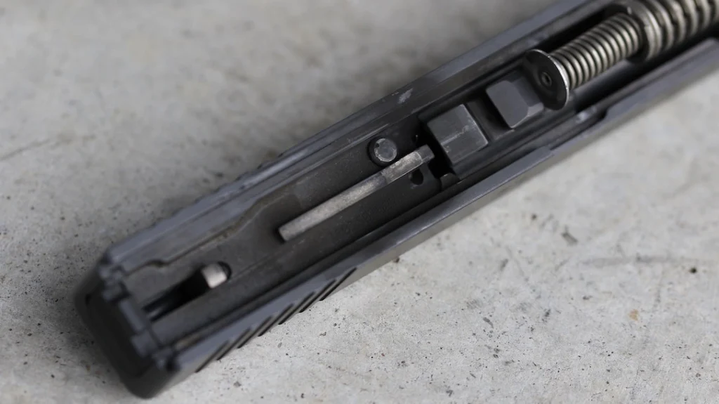 Glock 19 Torture Test: Is a Glock 19 self-cleaning? No. Hardly. Will debris and build-up shift itself during live fire? It looks like it to me.