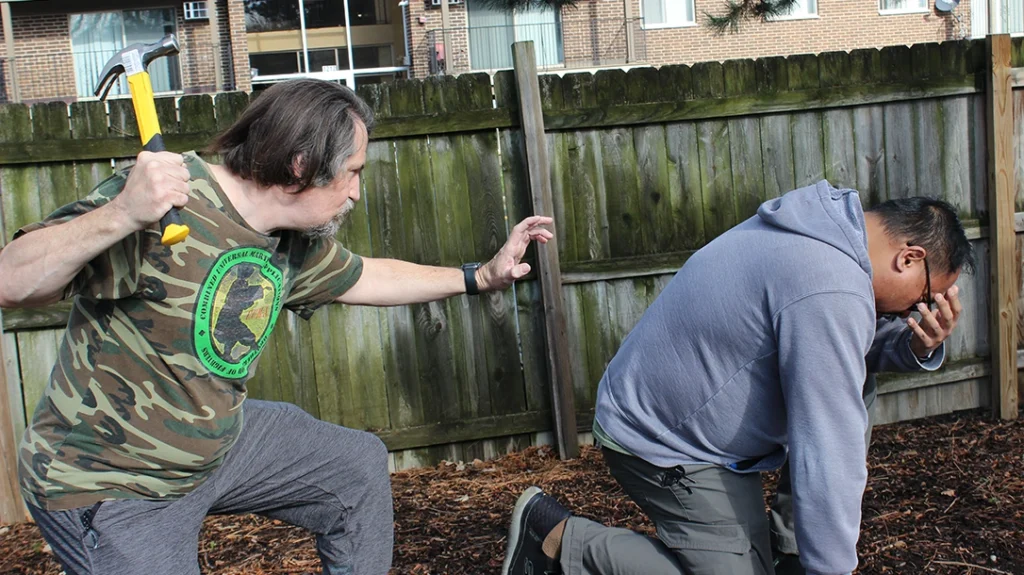 Frank is down, holding his face. Don is prepared to continue the fight. However, it seems that he has bought enough time to return to his vehicle and leave.