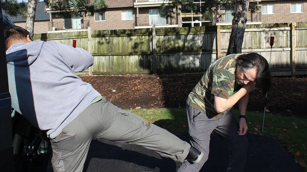 Frank delivers a full power side stomp kick to Don’s knee.