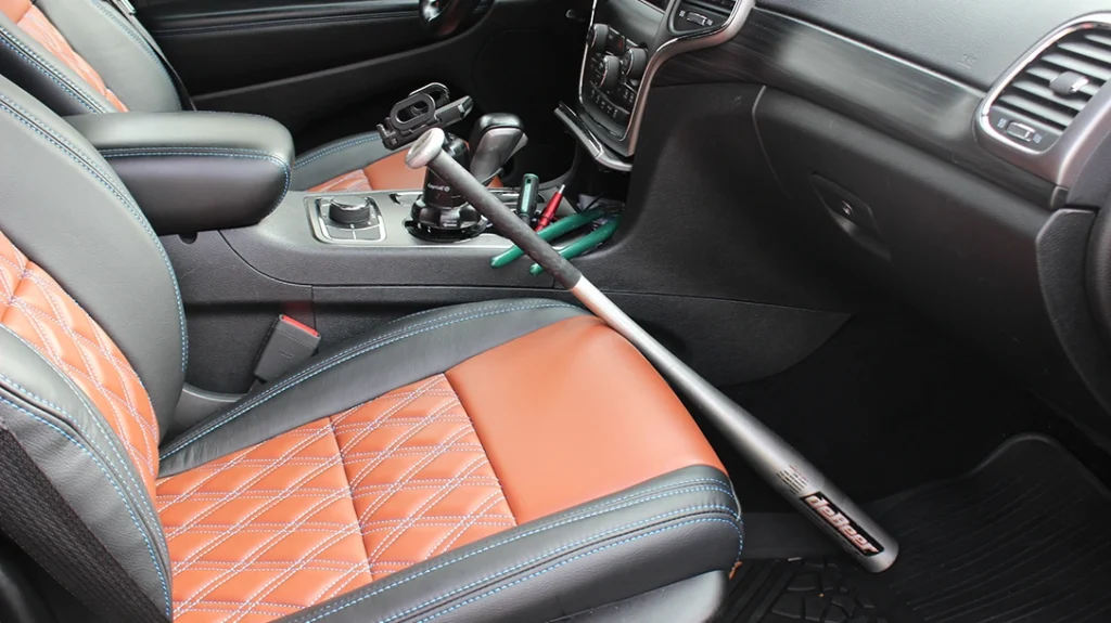 Bats can be kept in your vehicle, are easy to explain if found, and make great improvised weapons.