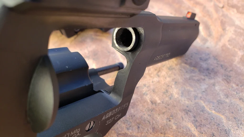 The 327 had a rough and improperly cut forcing cone. Nelson Gunsmithing corrected the problem, fixing the tumbling issue.