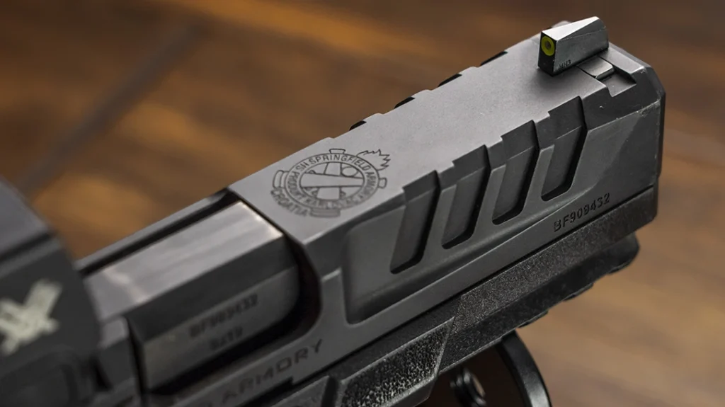 The slide includes front and rear cocking serrations, which is an understatement.