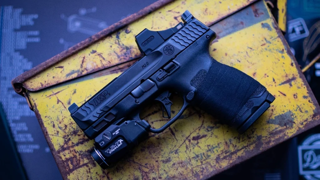 The combination of weapon-mounted lights and red dot optics works particularly well for shotguns and carbines.