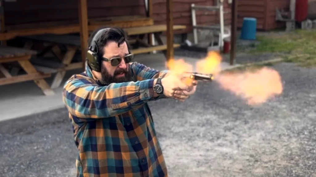 The author shooting the Zastava M.83 revolver.