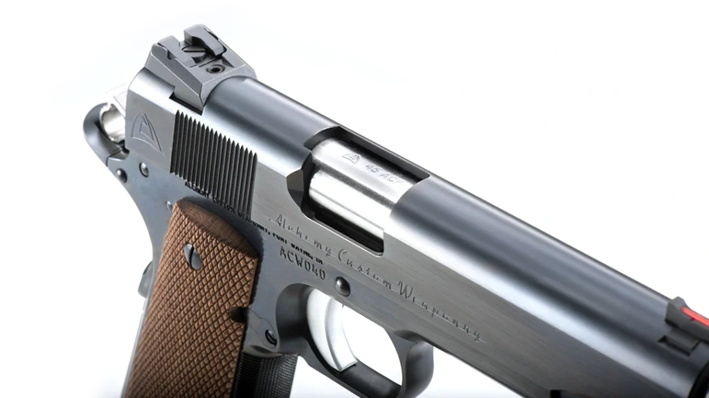 There is a beveled magazine well, tuned and polished extractor, lowered ejection port, and extended billet steel pinned ejector.