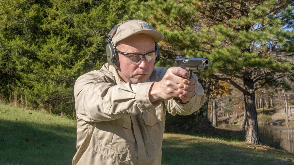 The author shooting the Alchemy Prime 1911.