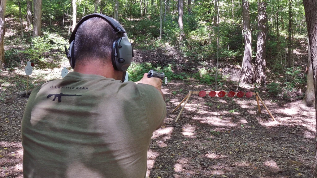 Bringing the pistol over to my steel pit, the author began testing splits and transitions against a plethora of Caldwell IPSCs and a CTS portable plate rack.