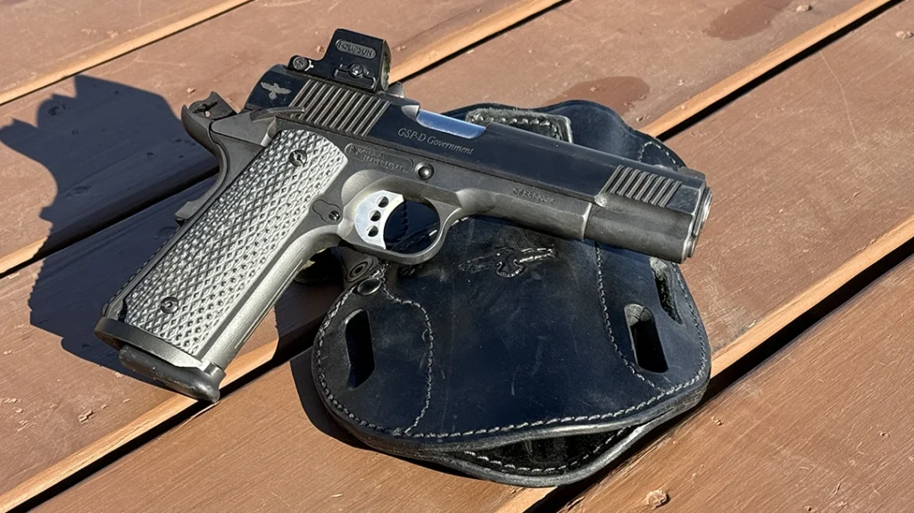 The author shooting the Finks Custom Gunsite Service Pistol.