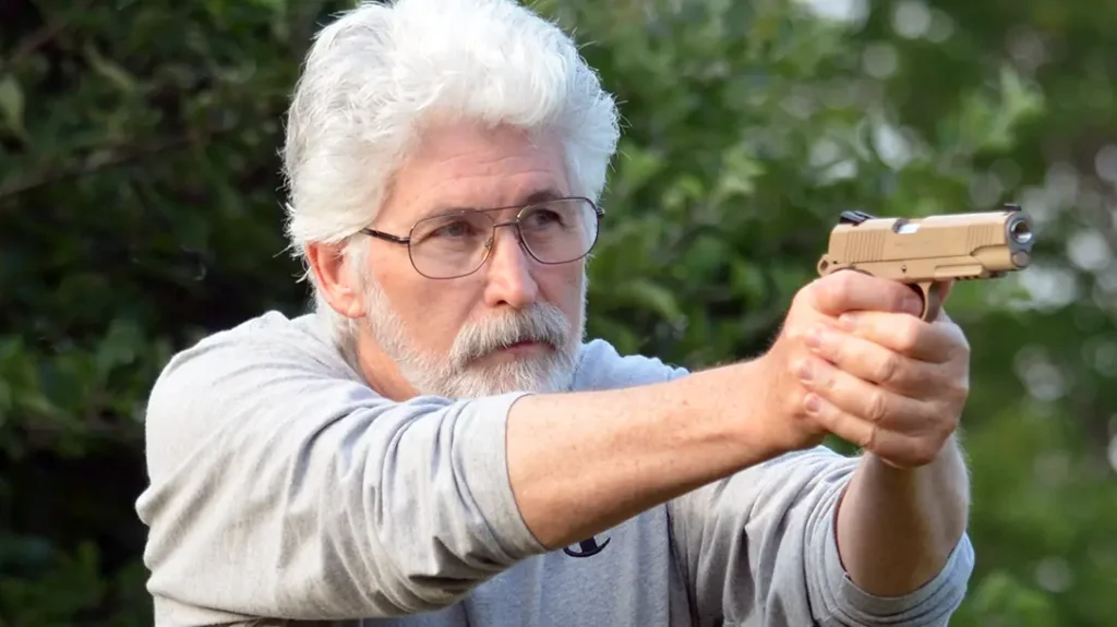 Colt Rail Guns: Here the author practices a draw-and-shoot drill using the Swiss Arms Desert Tan model.