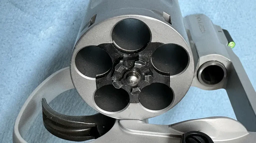 The cylinder's leading edge features a bevel treatment.