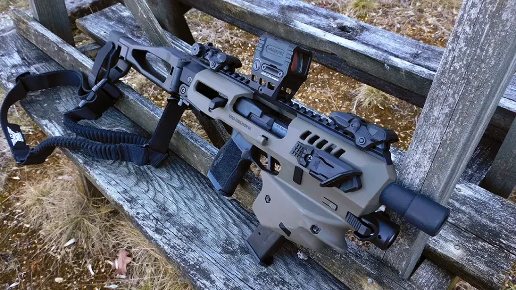 A full-length Picatinny rail adorns the MCK’s top, which pairs perfectly with the included flip-up iron sights with large and small rear apertures.