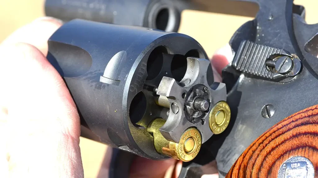 Charter’s patented technology on the Double Dog uses an extractor star with spring-loaded studs to engage the 9mm casing at the extraction groove.