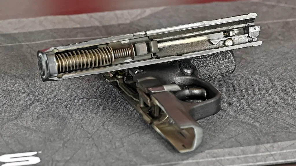 Before cleaning your handguns, check to make sure they are unloaded and then disassemble them.