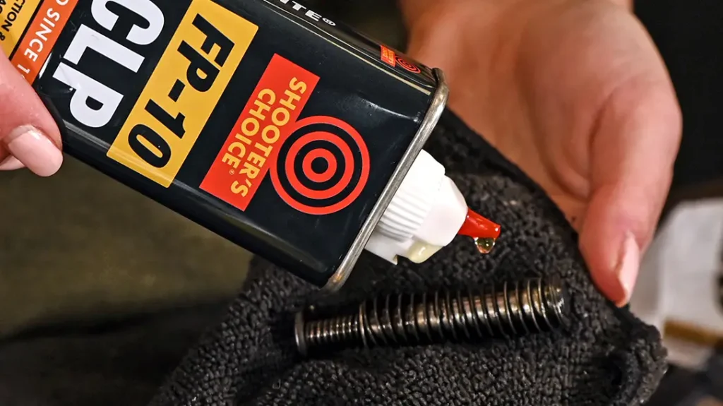 The author began with the recoil spring by dabbing some Otis FP-10 CLP all around the inner workings of the spring.