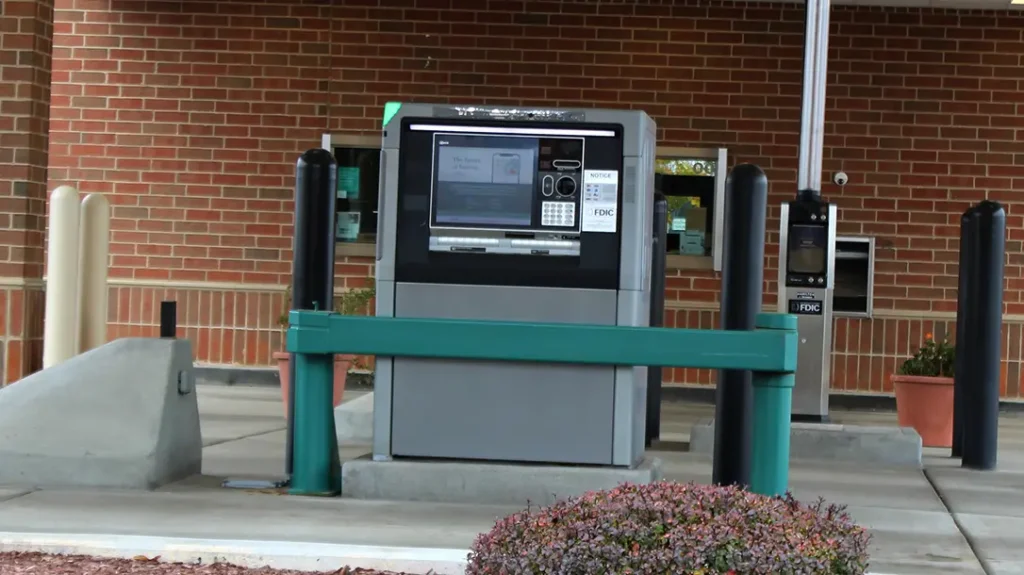 When getting money from an ATM, you should be practicing situational awareness principles and leave as soon as you have your money.