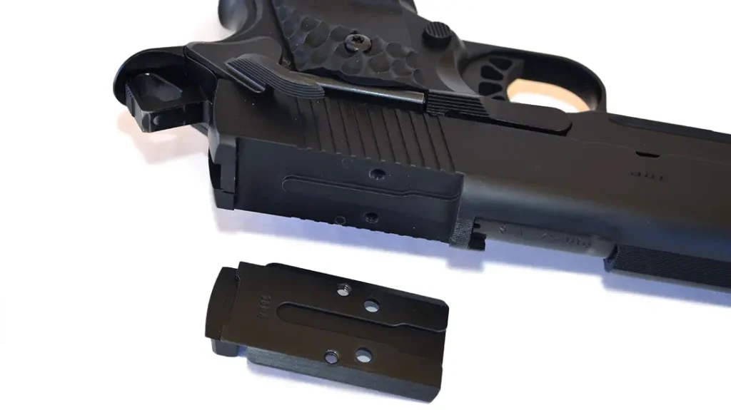 Developed in collaboration with Agency Arms, the Agency Optic System (AOS) on the Springfield Armory TRP AOS uses plates equipped with a rear sight to attach the most popular red dot optics.