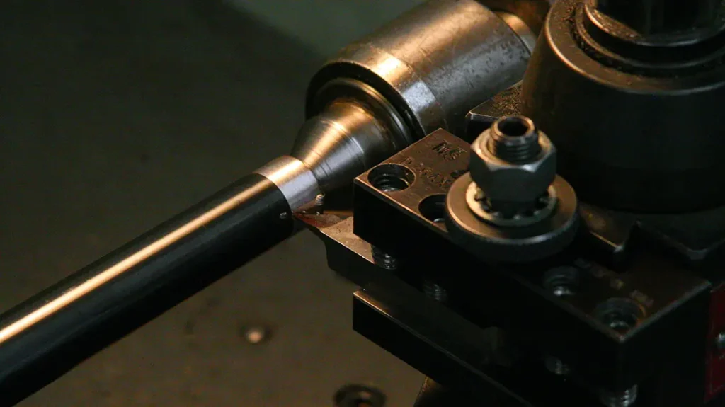 Turing the barrel for installation of a muzzle brake. 