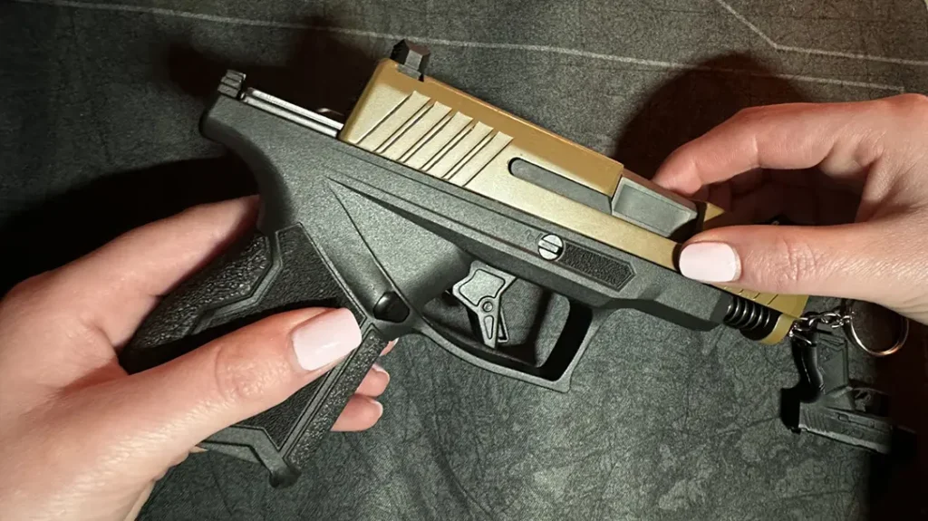 Pulling the slide forward, it separated from the frame in one swift motion.