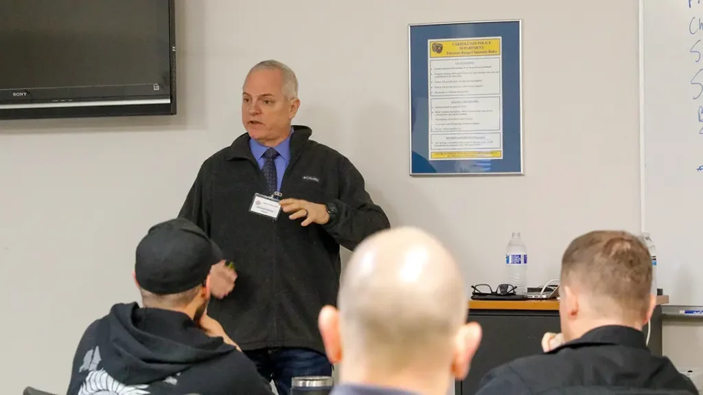 What to Say to Police: Attorney Andrew Branca, shown here lecturing at Tom Givens’ Rangemaster Tactical Conference, endorses a brief statement after a self-defense shooting.