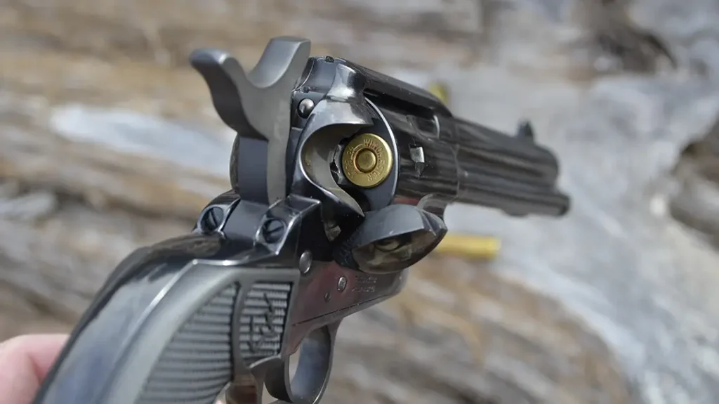 Loading the Taurus Deputy .45 Colt involves thumbing the hammer back to half-cock and opening the loading gate on the right side of the revolver.