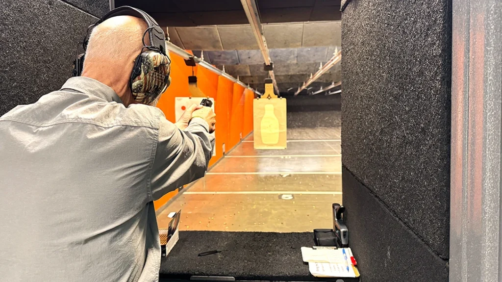 The author shooting the 5-yard stage of the 3/5/7 practical exercise.