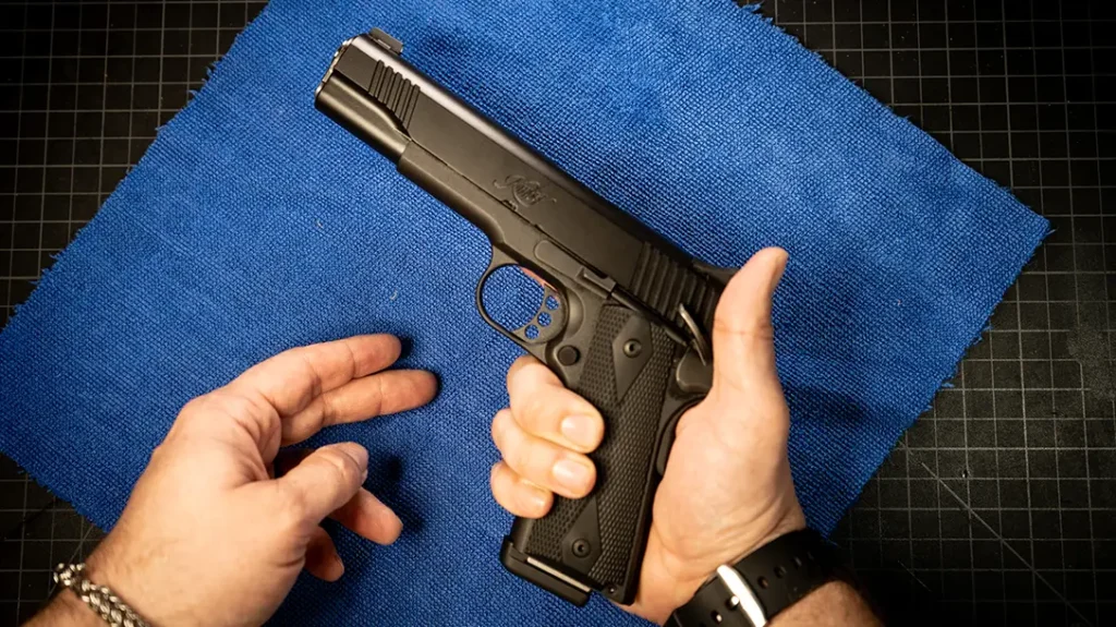 Open your fingers and form a “Y” between your thumb and index finger. Seat the pistol’s backstrap deep into that web.