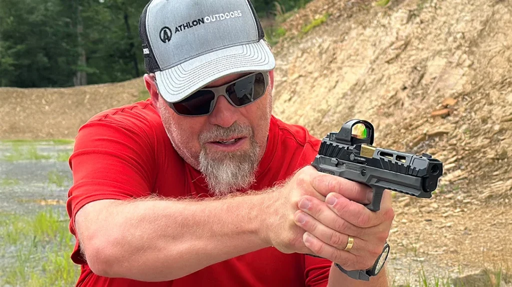 The author shooting the Origin Shooting Falling Steel Outlaw Pistol Match.