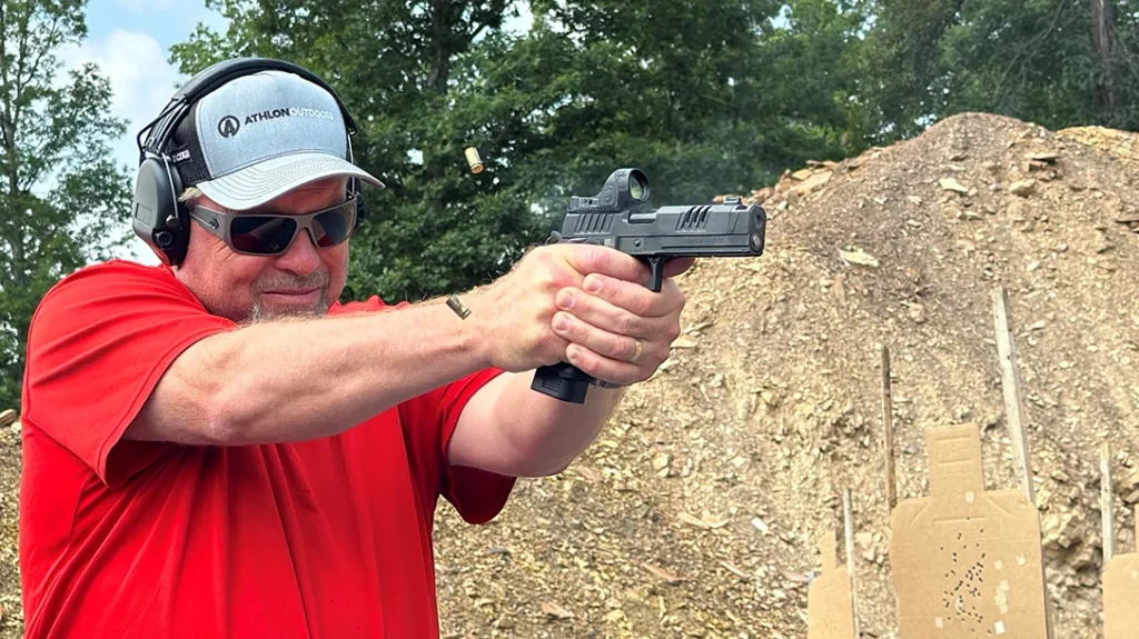 The author running an optic during an Origin Shooting Falling Steel Outlaw Match competition.