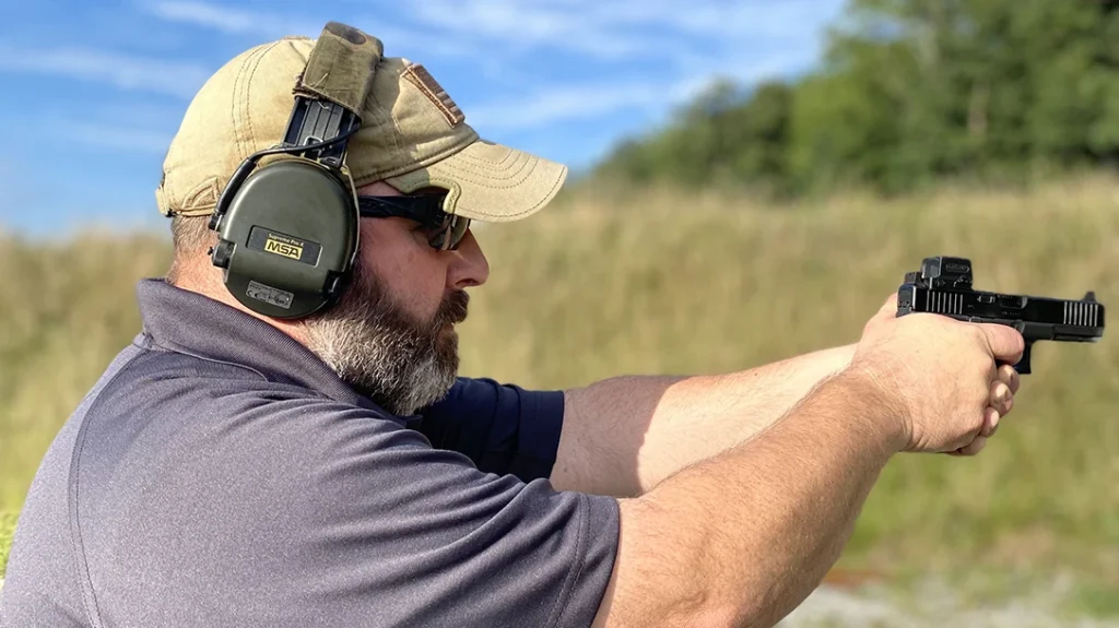 Brett Harnish, demonstrating shooting techniques.