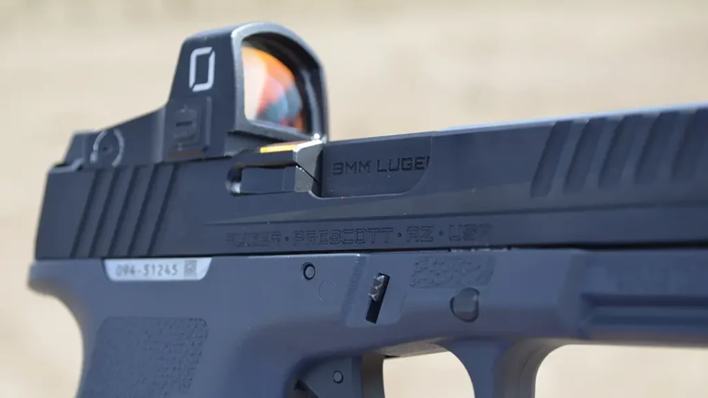 The author installed the red dot on the new Ruger RXM.
