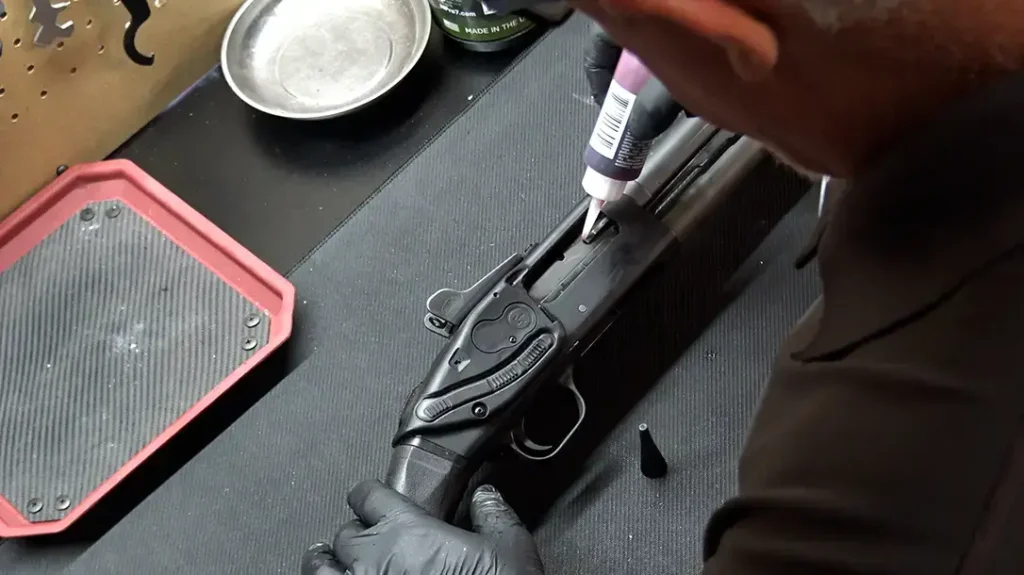 Lubricates and test the gun.