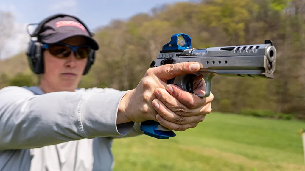 It is optics-ready, outfitted with a light, semi-flat trigger, a flared magwell, light rail, and more.